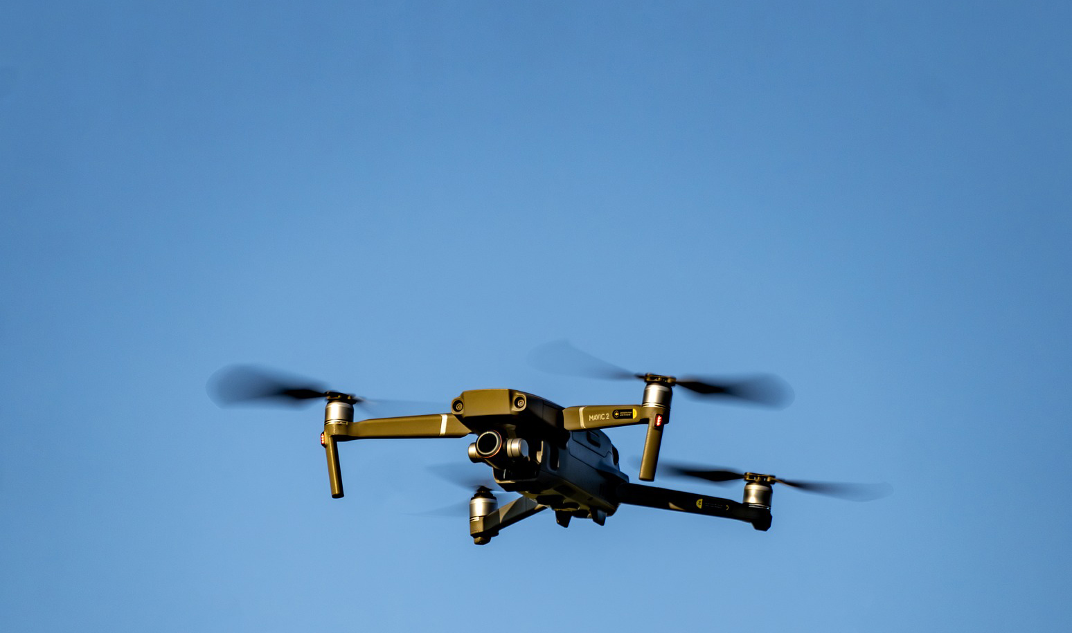 Mavic in the sky over a site